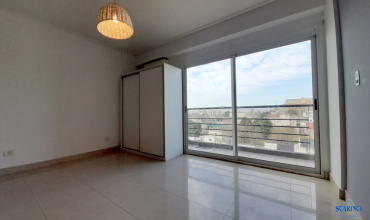 Monoambiente con balcón, amenities y Sum en Santos Lugares.